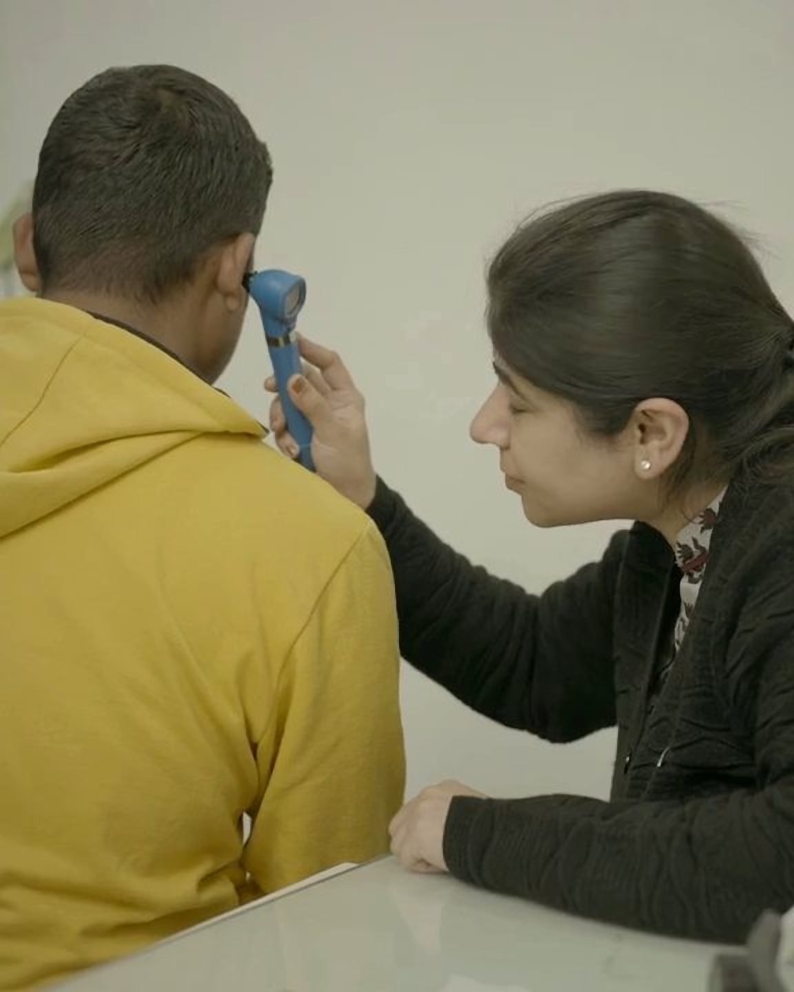 A doctor examining a patient at Radhakrishna Hospital