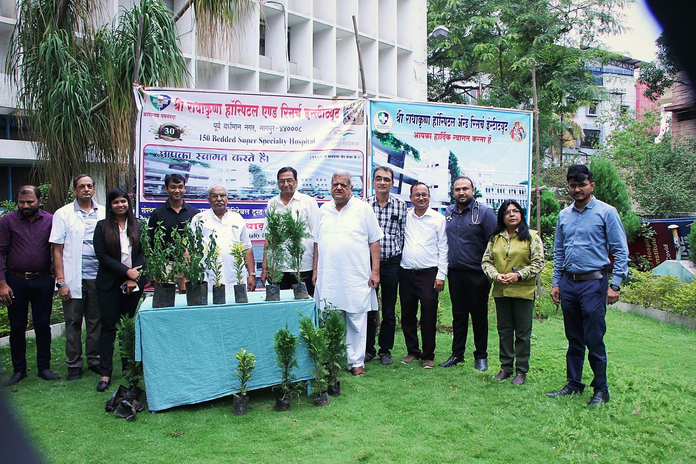 Tree plantation drive. Staff and consultants planting trees.